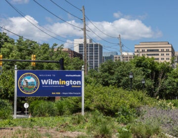 a sign reads Welcome to WIlmington