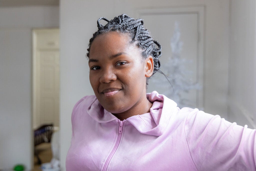 LaChenee Nelson Nelson poses for a photo in her apartment
