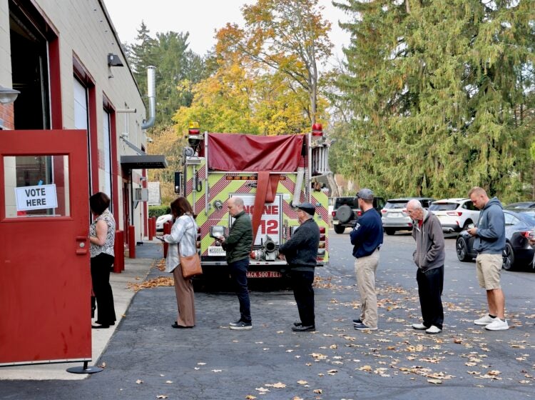 A voter line stretches out of the firehouse on Main Street in Moorestown Township, New Jersey.