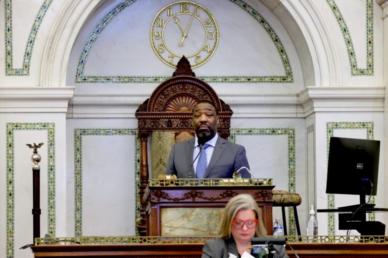 Kenyatta Johnson looks on