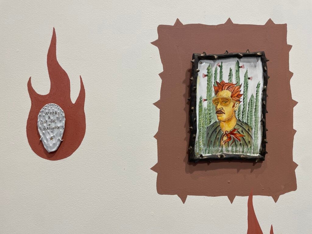 Pieces of art on the wall in the exhibition