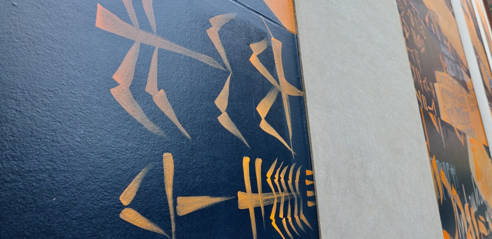 Ancient Babylonian words on Ella Ponizovsky Bergelson's mural