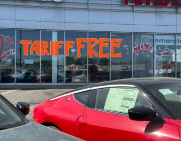 A Tariff Free sign to attract vehicle shoppers is at an automobile dealership in Totowa, N.J., on April 30, 2025. (AP Photo/Ted Shaffrey)
