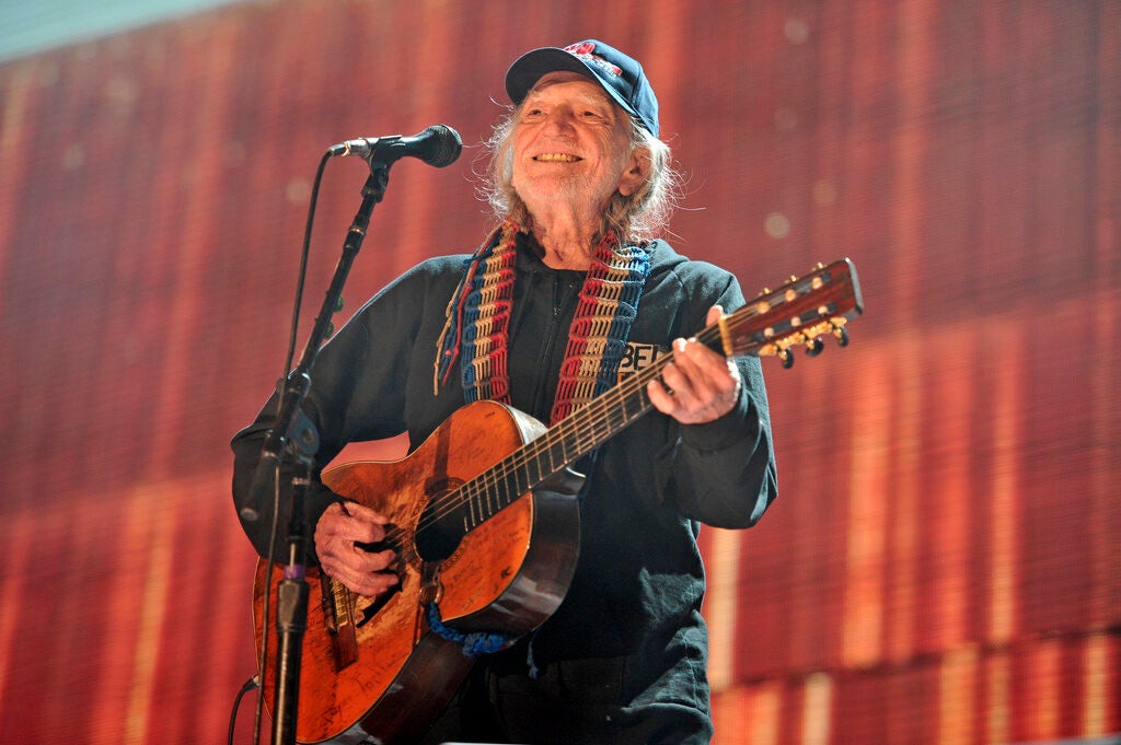 Country artist Willie Nelson performs on stage