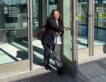 Heather Honey, a conservative election researcher, leaves the federal courthouse in Harrisburg