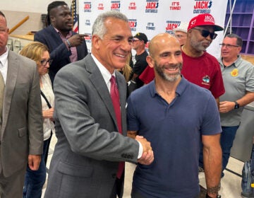 Republican candidate for NJ governor Jack Ciattarelli shakes a man's hand