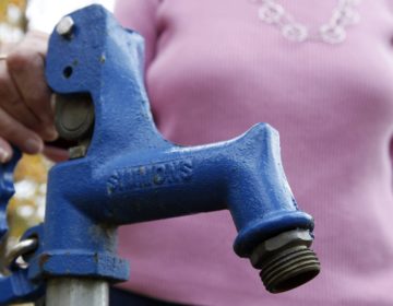 a close-up of a tap for well water