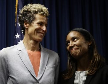 Montgomery County Assistant District Attorney Kristen Feden (right) and accuser Andrea Constand react at a news conference after Bill Cosby was sentenced to three to 10 years for sexual assault Tuesday, Sept. 25, 2018, in Norristown, Pa.