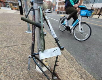An up-close view of a bike that has a tag on it.