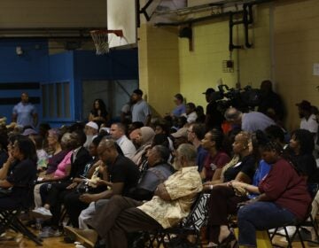 People sitting and standing in Christy Rec Center