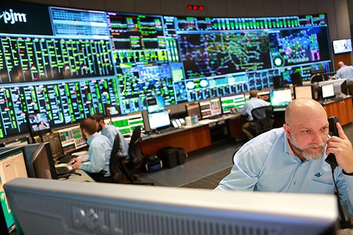 File: A view inside the control room at PJM Interconnection, which operates the electric grid for 65 million people in 13 states and the District of Columbia. (Courtesy of PJM Interconnection)
