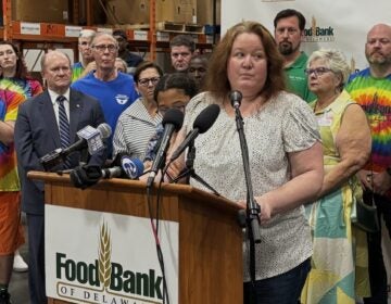 Elizabeth Morales speaking at a podium