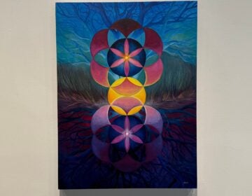 A Jen Hintz Eggers painting on a wall at the Mezzanine Gallery