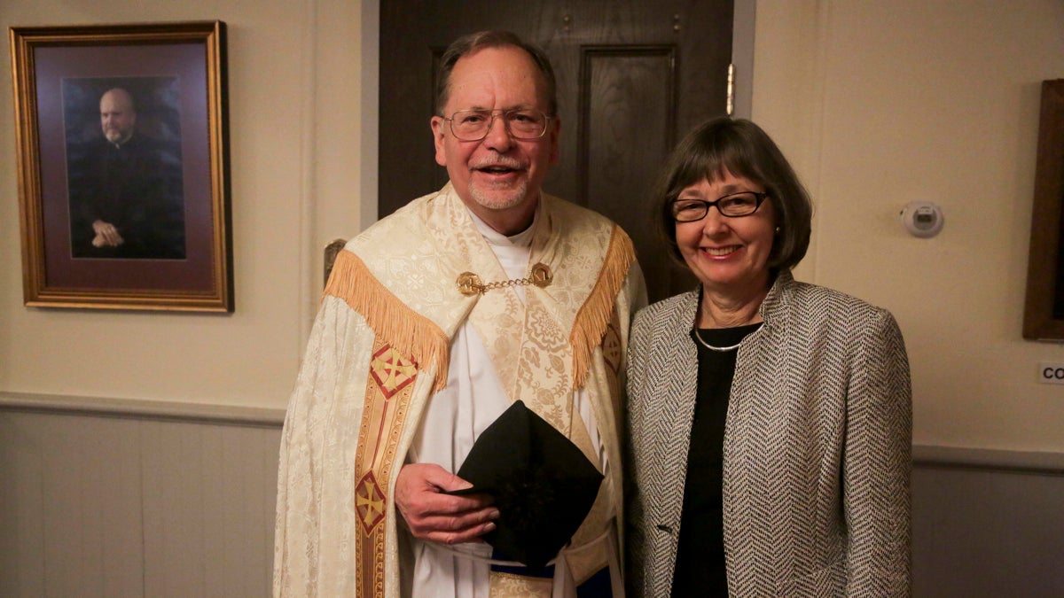 Father Leonard Klein of St. Patrick's in Wilmington, one of only about 100 married Catholic priests in the U.S., stands with his wife, Christa. (Kevin Cook/for Newsworks)