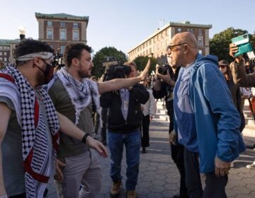 Mahmoud Khalil debates with a pro-Israel demonstrator