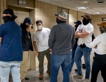 Federal agents patrol the halls of immigration court