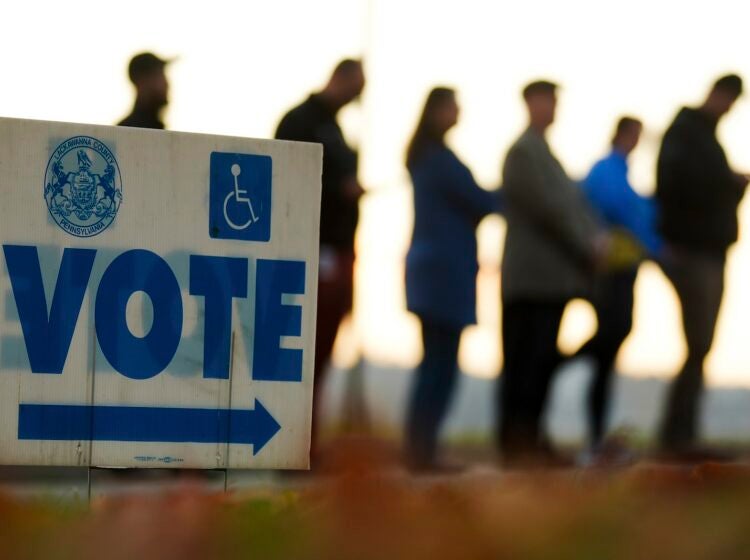 Voters wait in line to cast their ballots at Scranton High School on Election Day, Nov. 5, 2024.