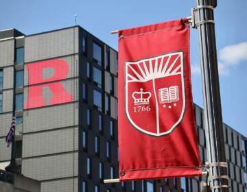 A red banner and a building with a red 
