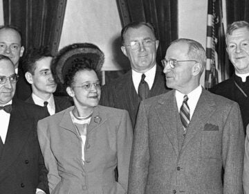 Sadie Alexander stands alongside President Harry Truman and others