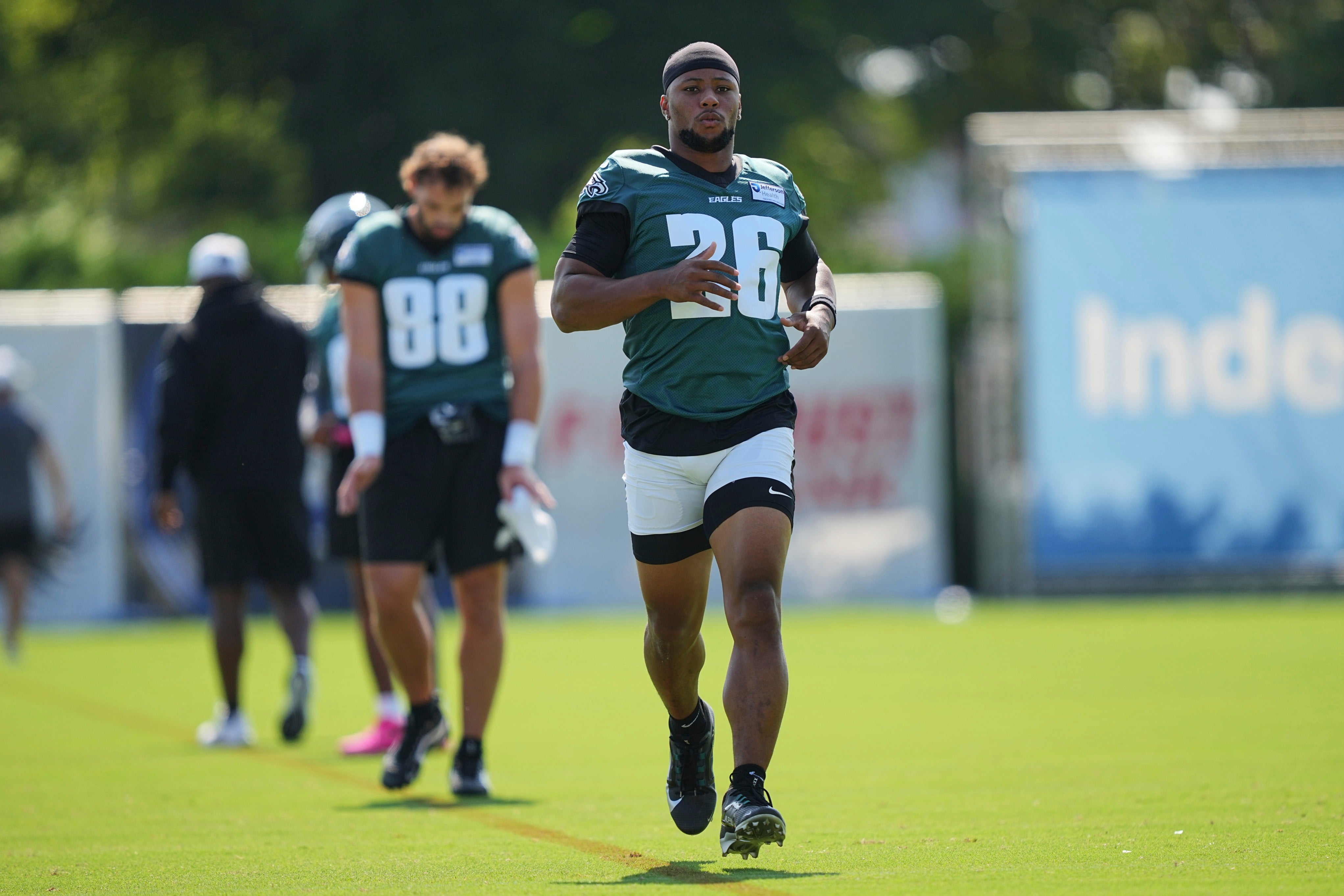 Saquon Barkley jogging during practice