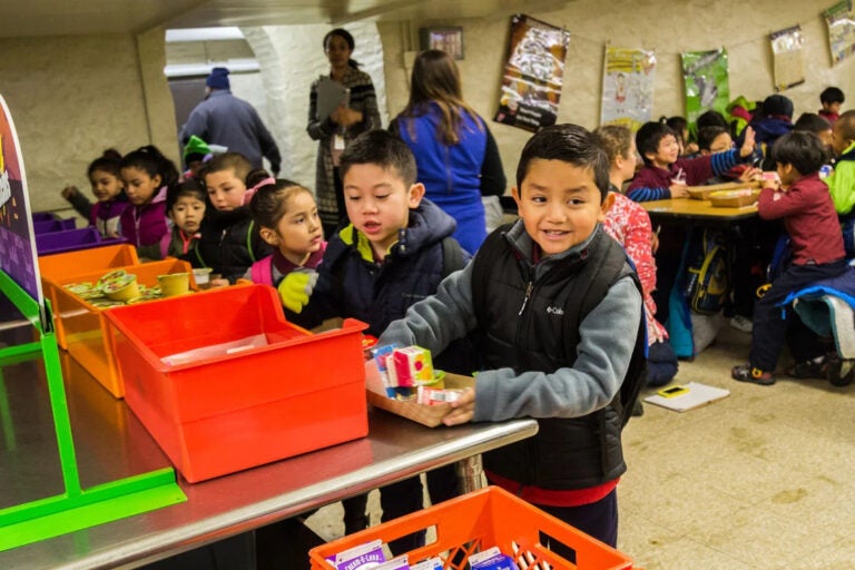 School children picking up breakfast