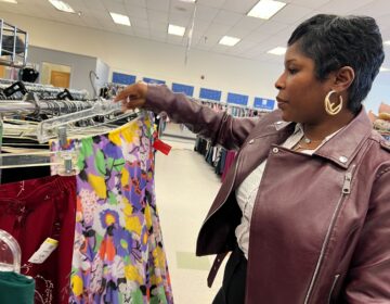 Woman observing clothing rack at B-Bop Vintage in Philadelphia