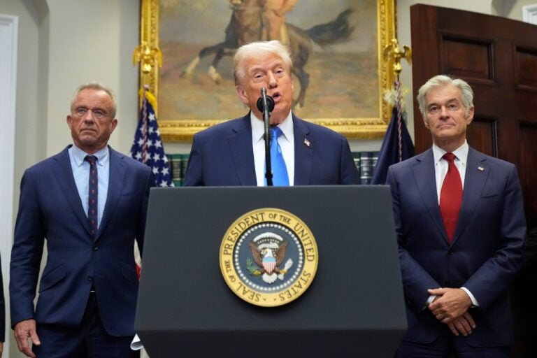 President Donald Trump speaks in the Roosevelt Room of the White House alongside Robert F. Kennedy Jr. and Dr. Mehmet Oz